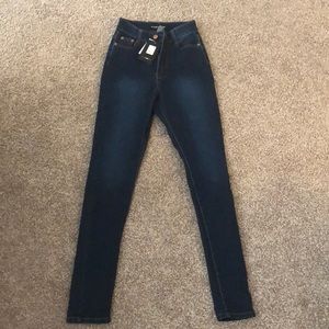 High waisted dark wash skinny jeans